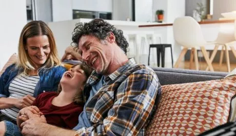 Family enjoying the heated floor in Caledon home